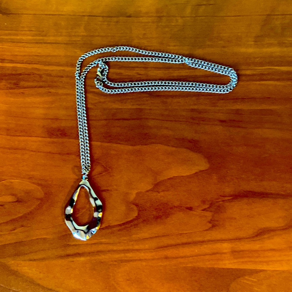 Silver accent chain.